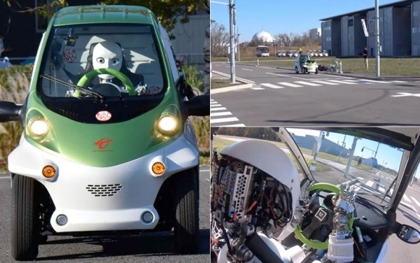 В Японии научили робота-андроида водить автомобиль